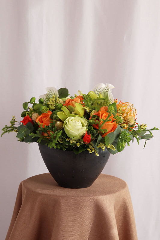 季節のおまかせオレンジ・グリーン系コンパクトアレンジ