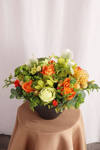 季節のおまかせオレンジ・グリーン系コンパクトアレンジ
