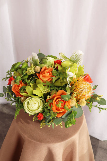 季節のおまかせオレンジ・グリーン系コンパクトアレンジ